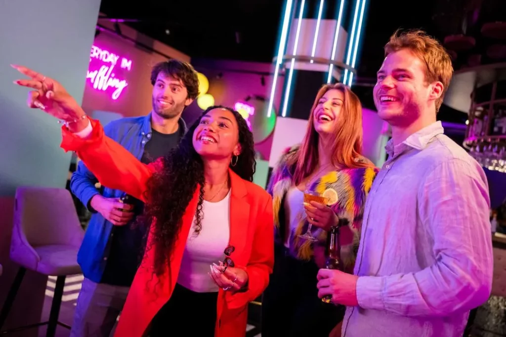 Dynamic lighting by Vivalyte enhances the excitement at The All Out Amsterdam’s darts booths, perfect for lively competition.